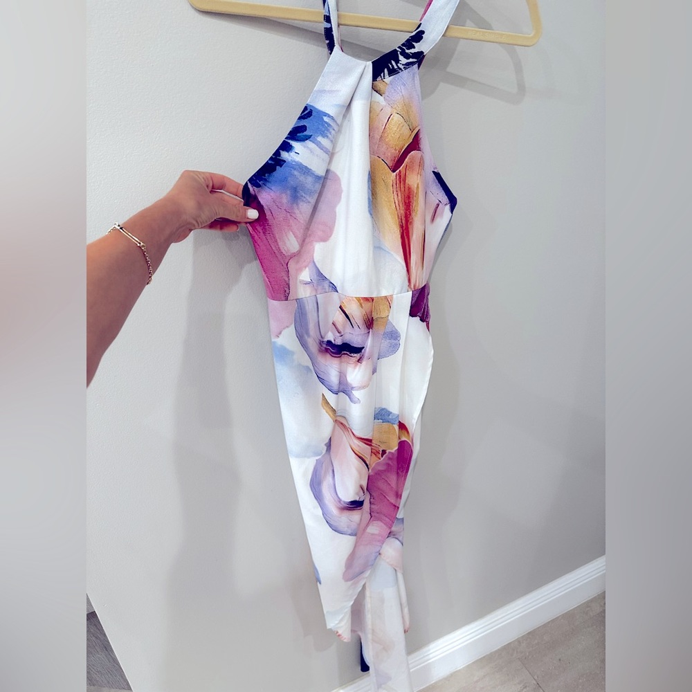 Halter style floral tulip dress with long, exposed zipper T back
